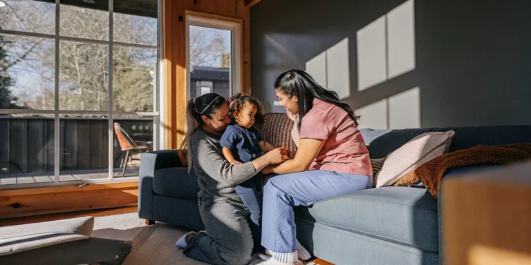 Nurse explaining GAPP vs Medicaid home health Georgia to a family