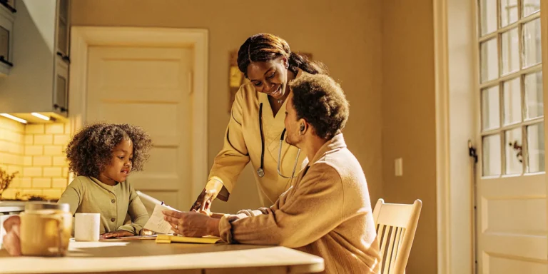 Georgia family preparing GAPP application documents with a pediatric nurse