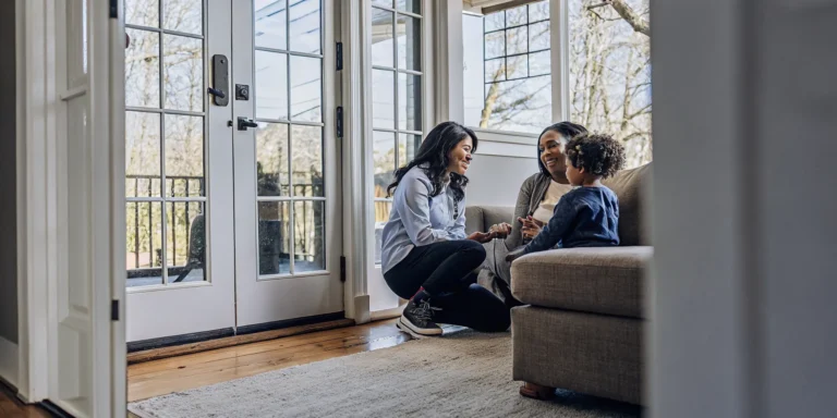Pediatric home care nurse speaking with a parent and child about the Georgia Pediatric Program GAPP