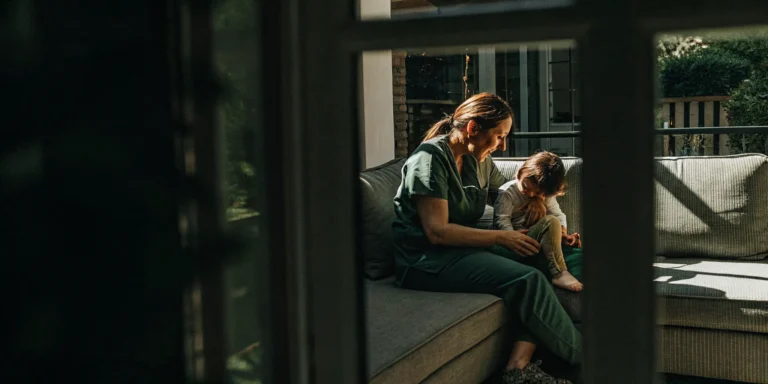 Pediatric nurse caring for a child at home in Georgia