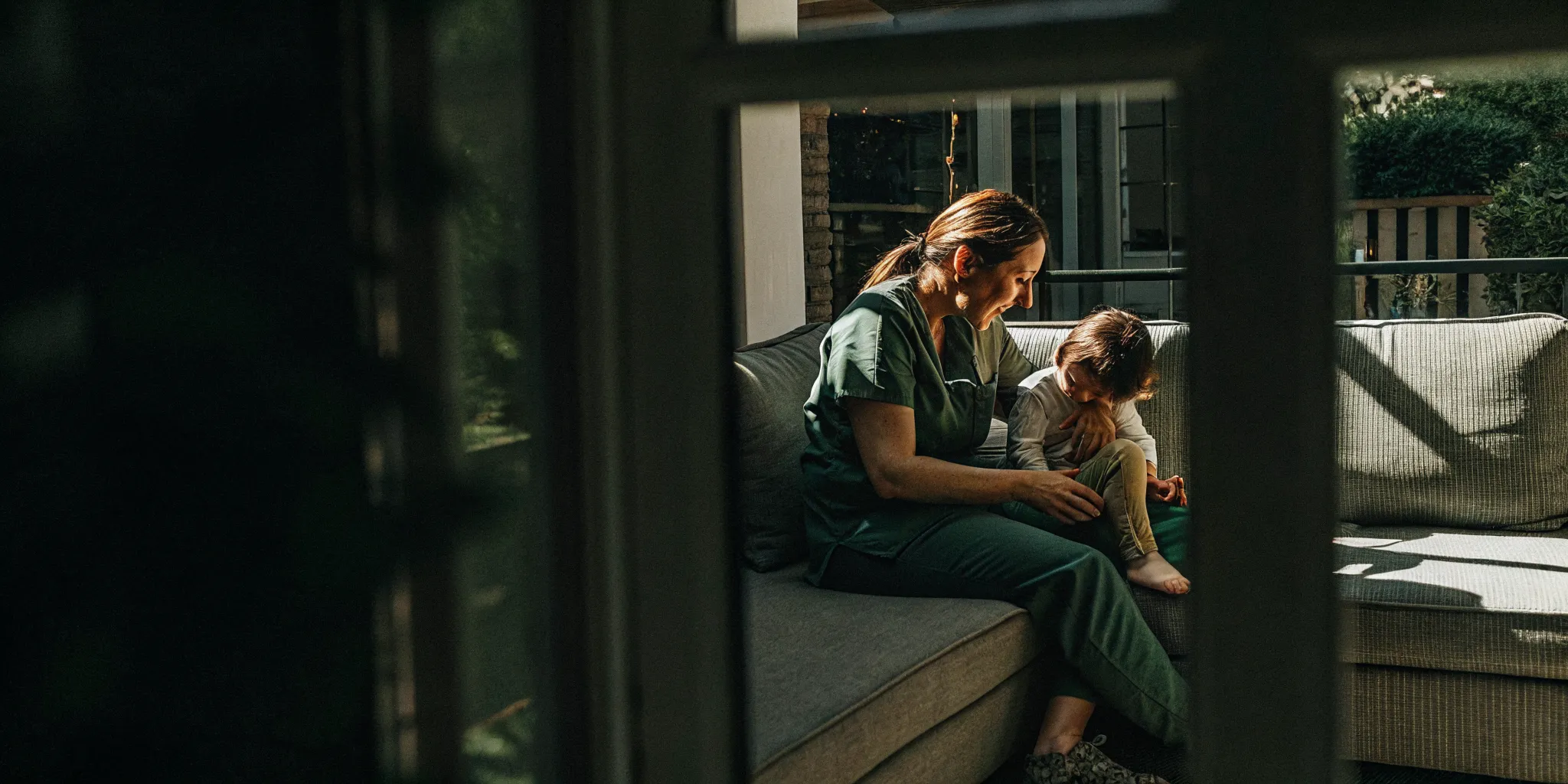 Pediatric nurse caring for a child at home in Georgia