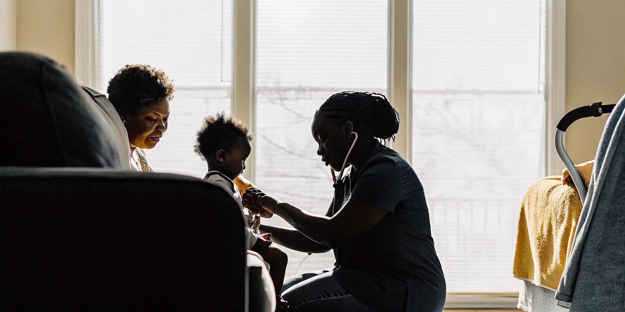 Pediatric nurse caring for a child in a home setting in Columbus, Georgia
