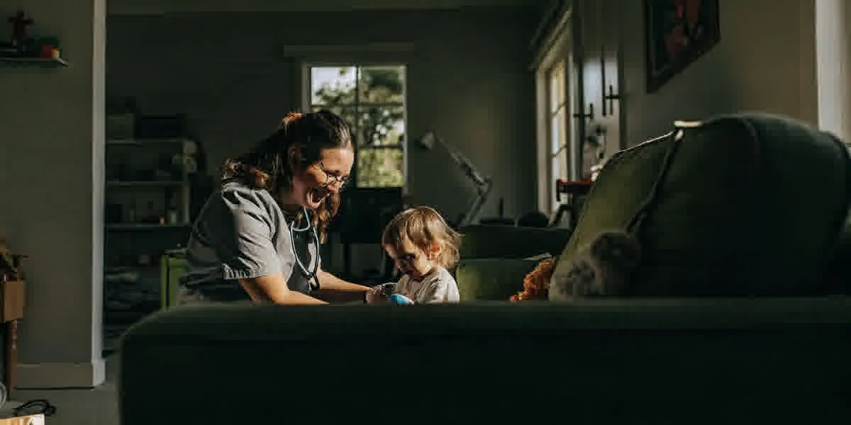 Pediatric nurse caring for a child at home in Macon, Georgia